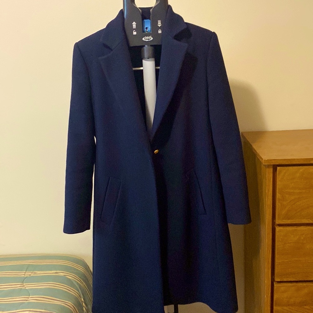 Navy blue fall midi length fall coat.